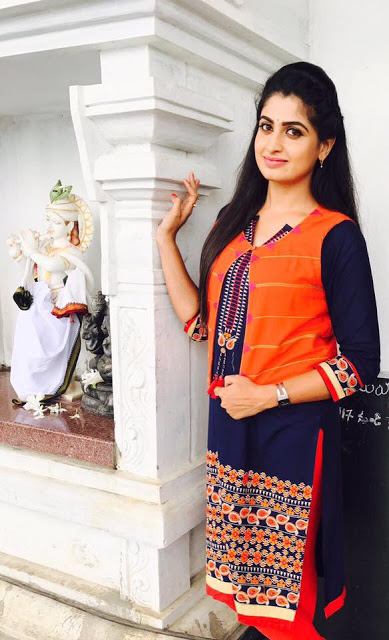 Telugu Serial Actress Chaitra Rai Stills In Orange Dress 16